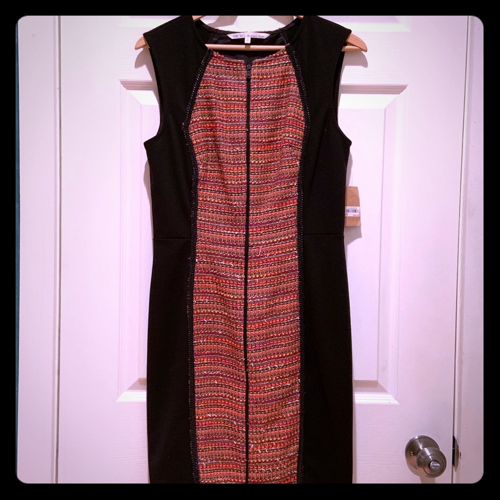 Work or play black dress with unique details